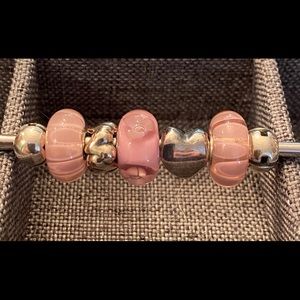 Trollbeads pink beads and I Luv you beads.